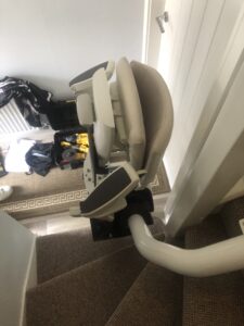 a slim stairlift avoiding a doorway