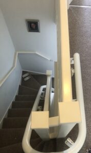 a narrow staircase stairlift installation
